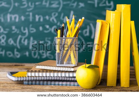 School supplies on the background of the school board