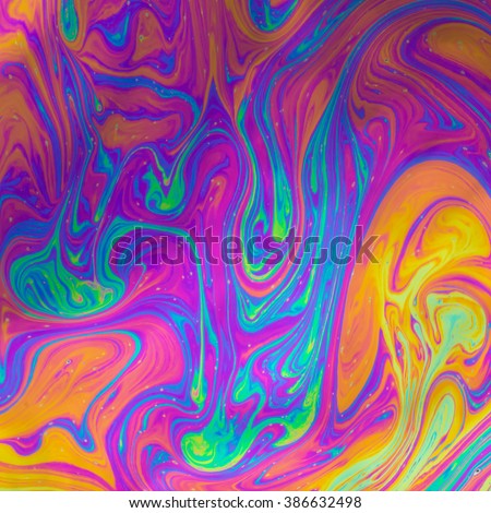 Psychedelic, multicolored soap bubble abstract background Royalty-Free Stock Photo #386632498