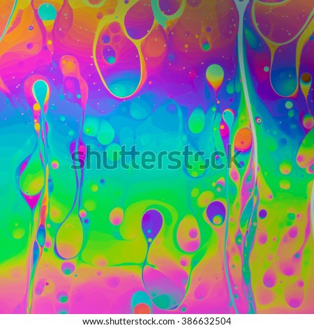 Psychedelic, multicolored soap bubble abstract background Royalty-Free Stock Photo #386632504