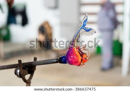 Handmade figures of melted glass - selective focus, copy space