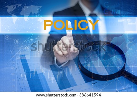 Businessman hand touching POLICY button on virtual screen
