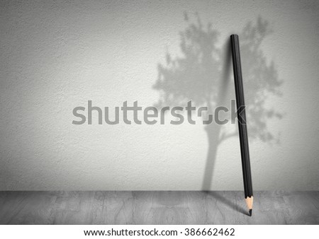Creative ecology concept, pencil with shadow of tree with copy space