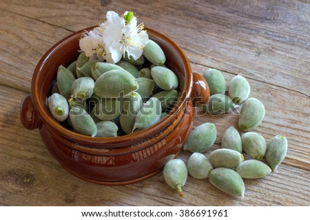 Green almonds. Royalty-Free Stock Photo #386691961