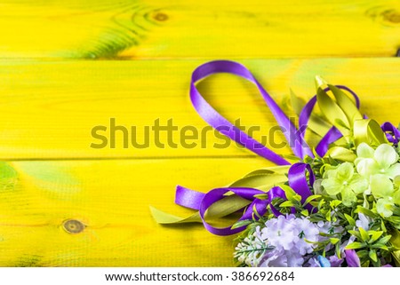 Easter decoration from easter eggs, easter boxwood and flowers.