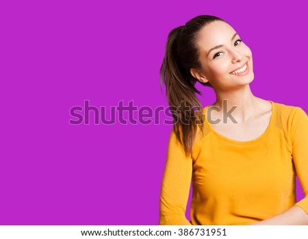 Portrait of an expressive brunette isolated on colorful background.