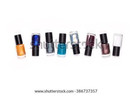 Many nail polish on a white background.
