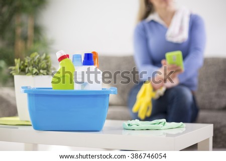 Housewife prepare cleaning products for cleaning house