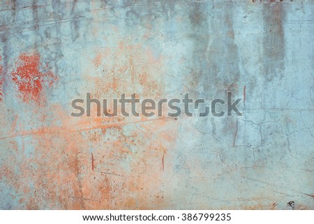 Rusty aged colored vivid concrete texture background. Vintage effect.
