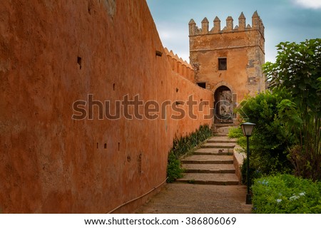 Walls and tower in the Kasbah of the Udayas, small fortified kasbah in Rabat, Morocco Royalty-Free Stock Photo #386806069