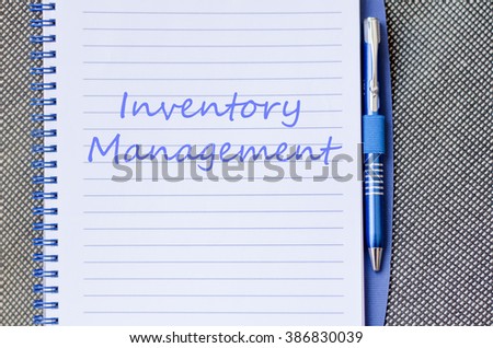 Inventory management text concept write on notebook with pen