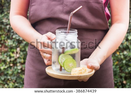 Butter scone and lime Infused detox water, stock photo