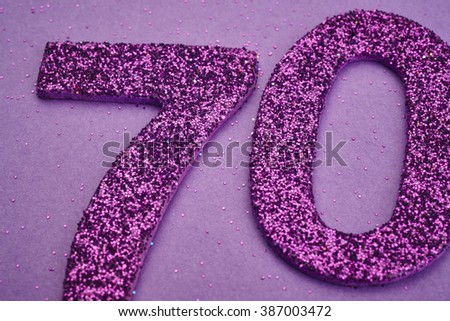 Number seventy purple color over a purple background. Anniversary. Horizontal