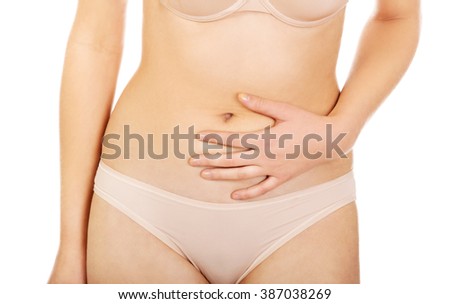 Young woman with stomach pain 