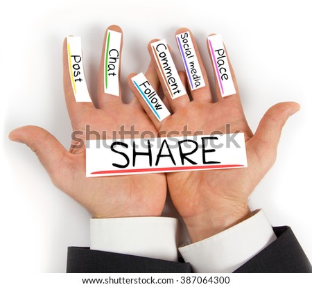Photo of hands holding paper cards with SHARE concept words