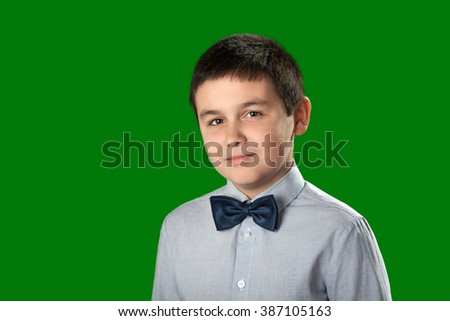 Photo of a sweet and young boy, child, portrait, on green screen
