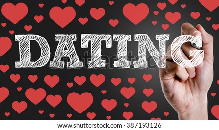 Hand writing the text: Dating