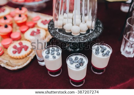 Wedding Candy Bar Buffet On The Table With A Tablecloth Color