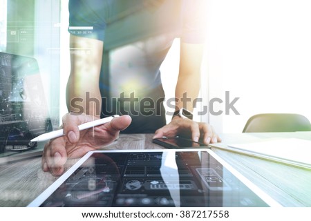 Website designer working digital tablet and smart phone and graphics design diagram, work from home as concept

 Royalty-Free Stock Photo #387217558