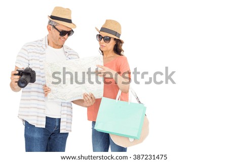 Couple with map and camera on white background