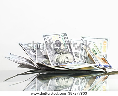 Heap of Dollar Bills isolated on white background