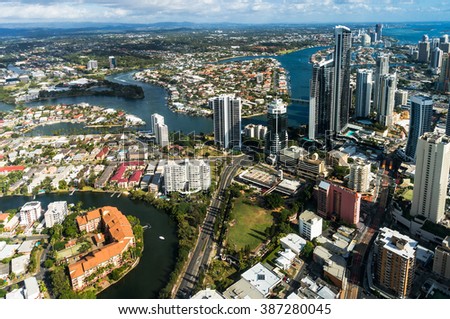 Australian neighbourhood aerial shot. Gold Coast Australia aerial shot of downtown and residential area with river. View from above on Surfers Paradise, Gold Coast, Australia