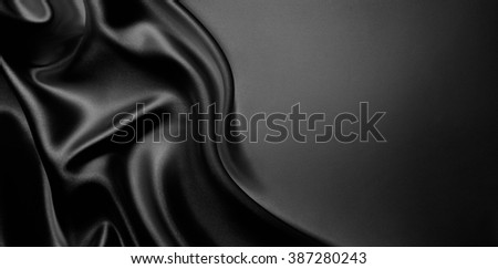 abstract background luxury cloth or liquid wave or wavy folds of grunge silk texture satin velvet material or luxurious Christmas background or elegant wallpaper design, background Royalty-Free Stock Photo #387280243
