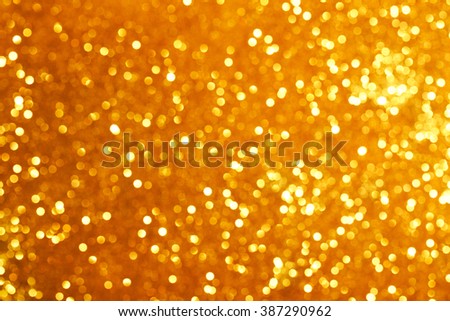 Golden glitter bokeh background.