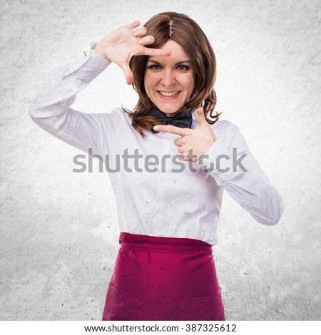 Waitress focusing with her fingers