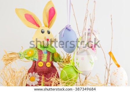 Easter bunny toy and decorated Easter eggs
