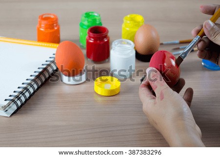 water-color, brush , book and palette isolated on white , egg easter