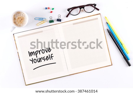 Improve Yourself text on notebook with copy space