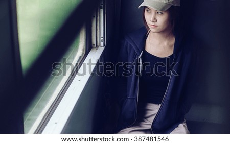 vintage portrait of a beautiful  Asia girl on a Train
