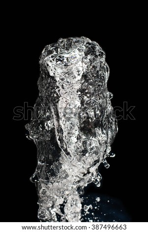High Speed Clear Water Fountain and stop with high speed shutter, Shallow depth of field, DOF