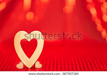 Valentines Heart on red fabric background
