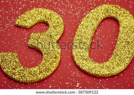 Number thirty yellow color over a red background. Anniversary. Horizontal
