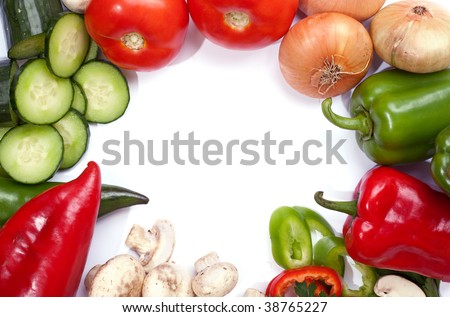 Fresh veggies around the frame with empty space of white background in the middle for text