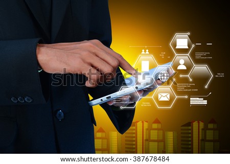 Man showing networking on tab in color background 