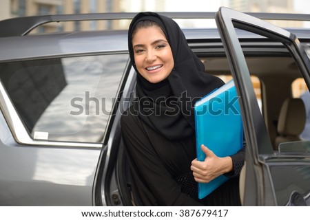 Emarati Arab Business woman in the car in Dubai, United Arab Emirates.