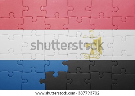 puzzle with the national flag of netherlands and egypt. concept