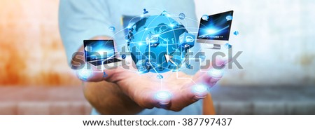 Man holding digital world connected to his fingers