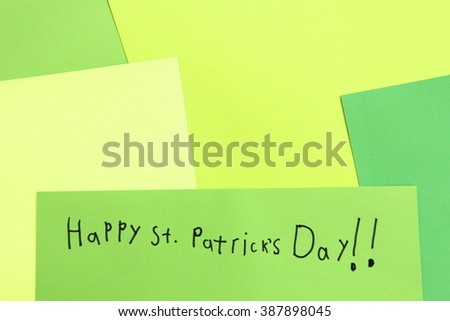 Happy St. Patrick's Day! Child's drawing with pen on green paper