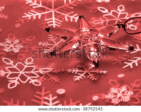 red Christmas background with star and snowflakes