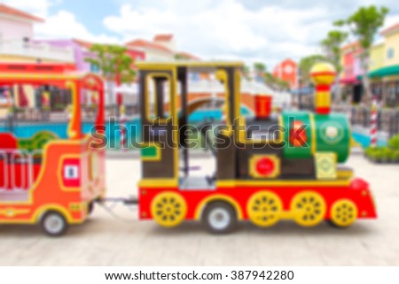 Abstract blurcarnival train at amusement park