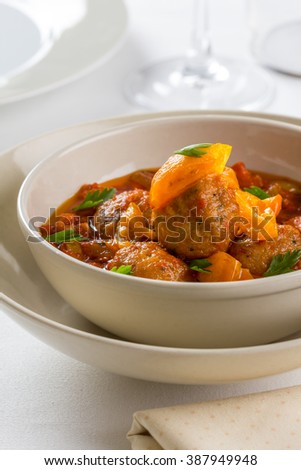 Meatballs in tomato sauce and parsley