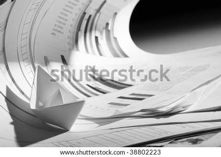 Business concept, paper boat and tsunami documents