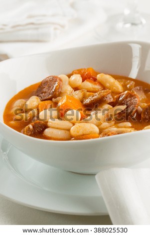 A bean stew with chorizo and carrot