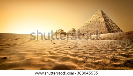 Pyramids in sand Royalty-Free Stock Photo #388045555