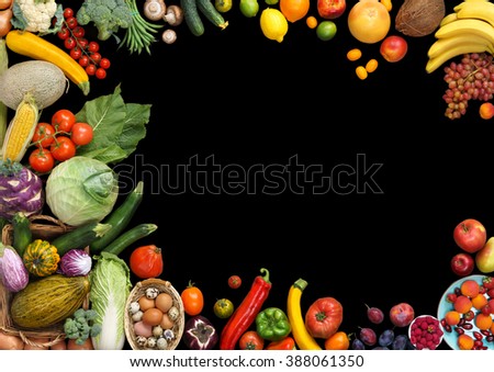 Deluxe food background. Food photography different fruits and vegetables isolated black background. Copy space. High resolution product