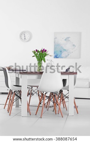 Modern living room with table and chairs