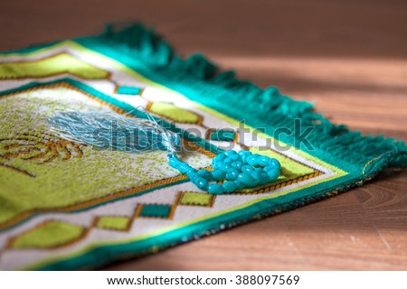 Mat for prayer , the rosary Royalty-Free Stock Photo #388097569